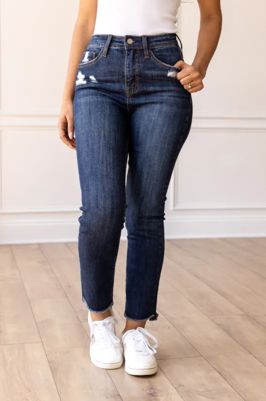 The Juliette Dark Wash Distressed Jeans sold by Charming Charlie