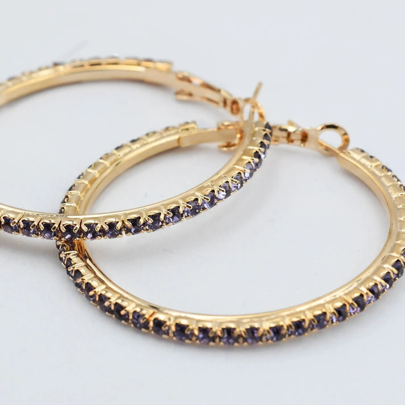 Mariah Purple Hoop sold by Charming Charlie