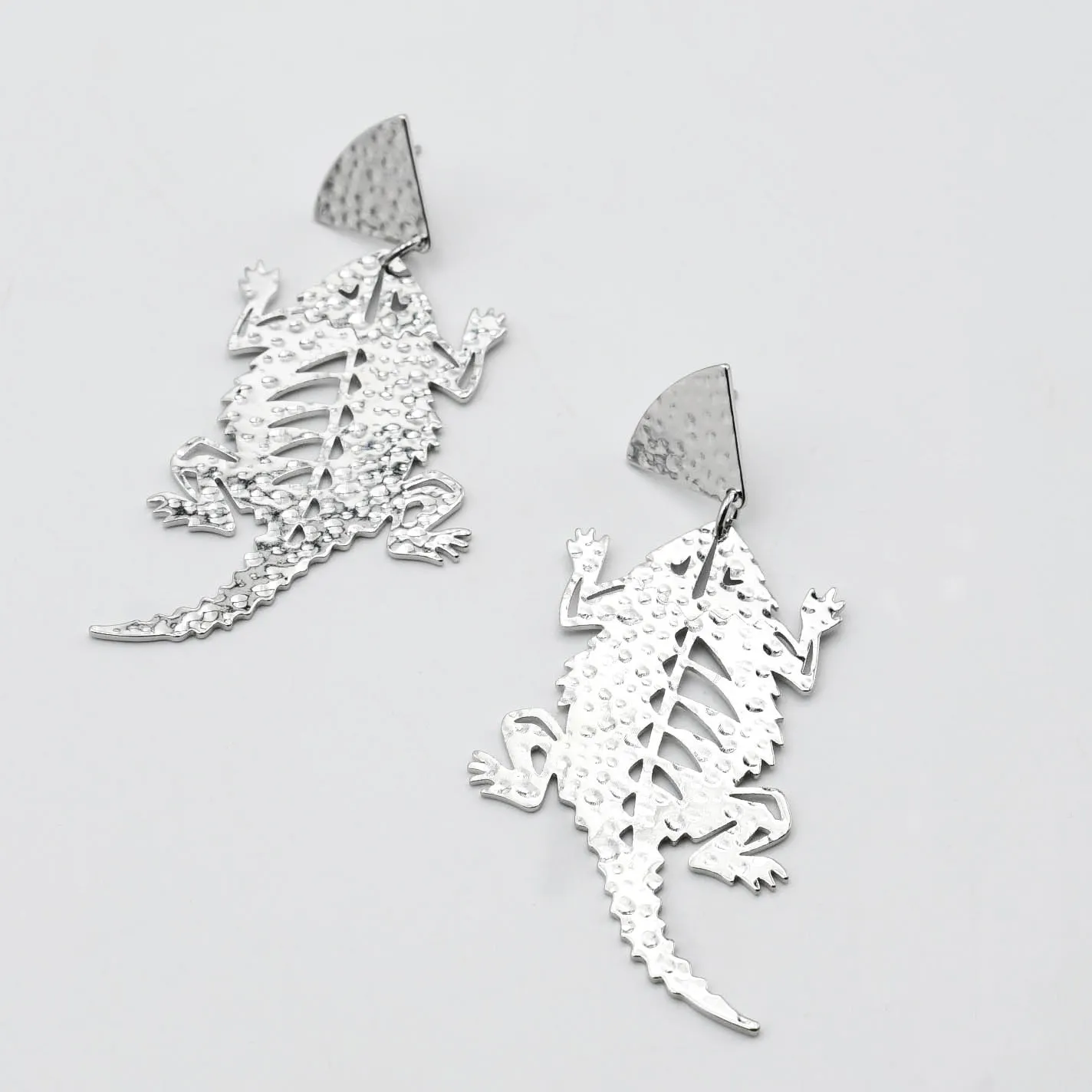 TCU Hornfrog Earrings Silver sold by Charming Charlie