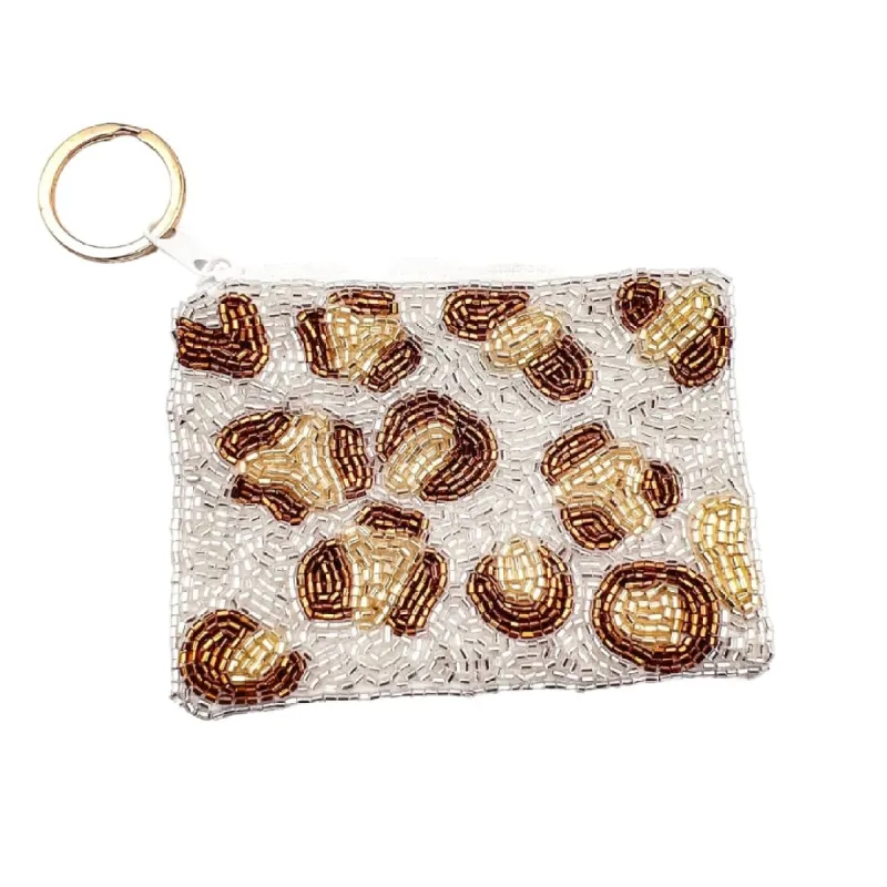 Snow Leopard Keychain Pouch sold by Charming Charlie