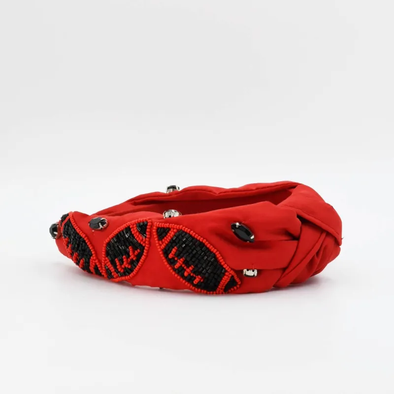 Black/Red Football Headband sold by Charming Charlie