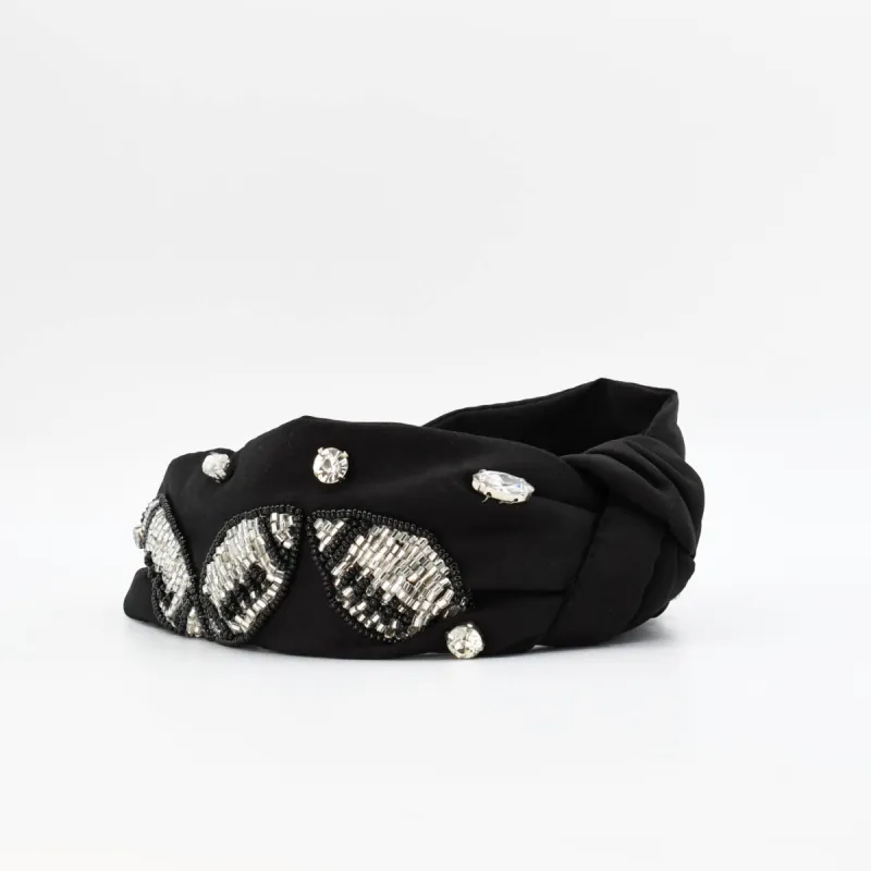 Black/Silver Football Headband sold by Charming Charlie