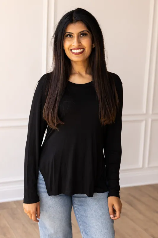 Not Your Basic Black Long-sleeved Side Split Top sold by Charming Charlie