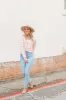 The Kathryn Button Down Floral Top sold by Charming Charlie