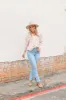 The Kathryn Button Down Floral Top sold by Charming Charlie