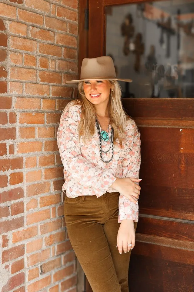The Kathryn Button Down Floral Top sold by Charming Charlie