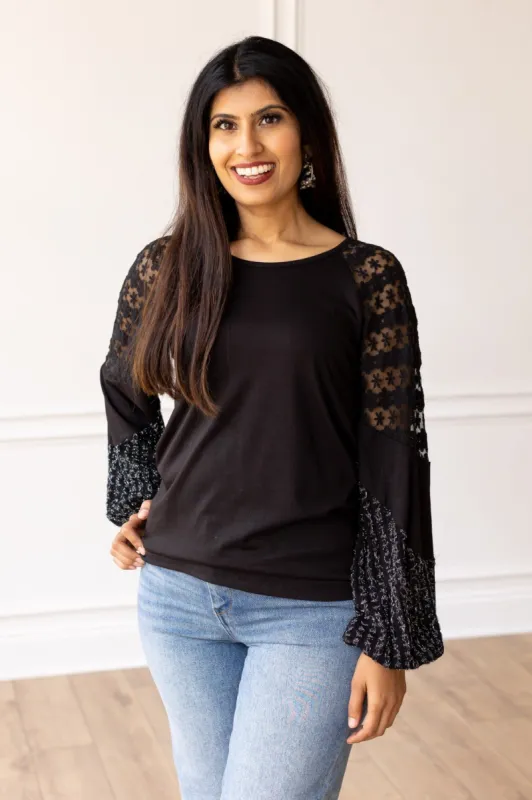 Enchanted Evening Black and Silver Lace Patch Sleeve Top sold by Charming Charlie