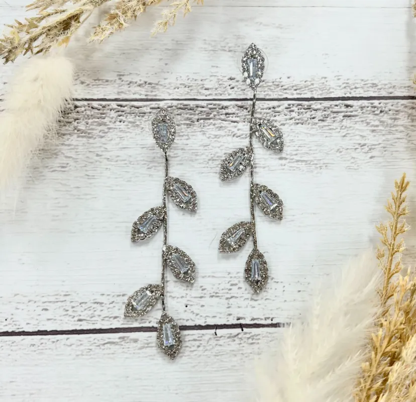 Love's Gilded Embrace: Silver Leaf Romance Earrings made by Charming Charlie