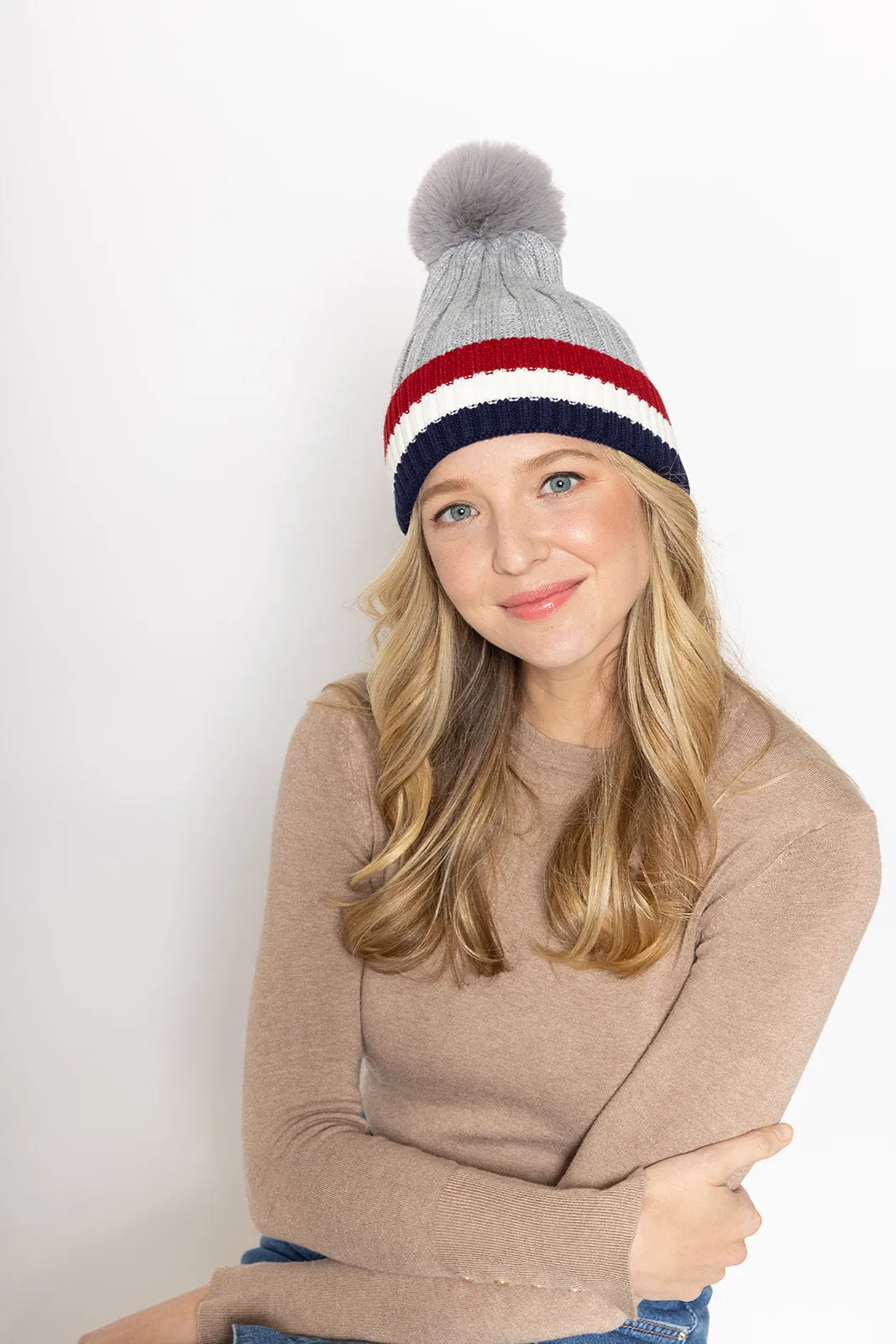Stripe Rib Beanie With Faux Fur Pom sold by Charming Charlie product image thumbnail 2