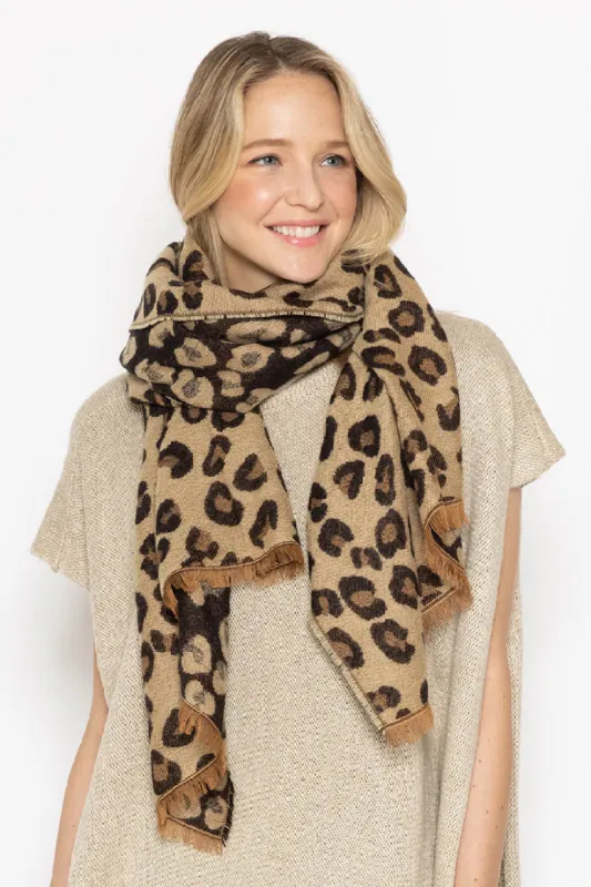 Leopard Reversible Cozy Scarf sold by Charming Charlie
