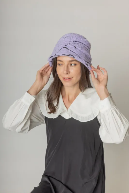 Geometric Sherpa Bucket Hat sold by Charming Charlie