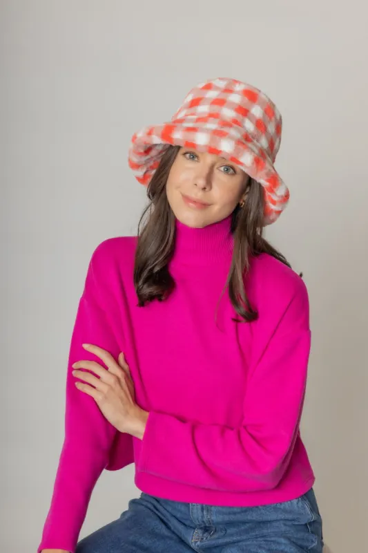 Checkered Faux Fur Bucket Hat sold by Charming Charlie