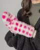 Checkered Faux Fur Mittens sold by Charming Charlie