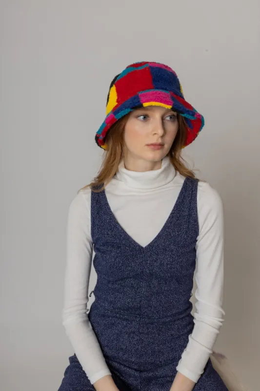 Color Block Sherpa Bucket Hat sold by Charming Charlie