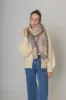 Color Bordered Scarf sold by Charming Charlie