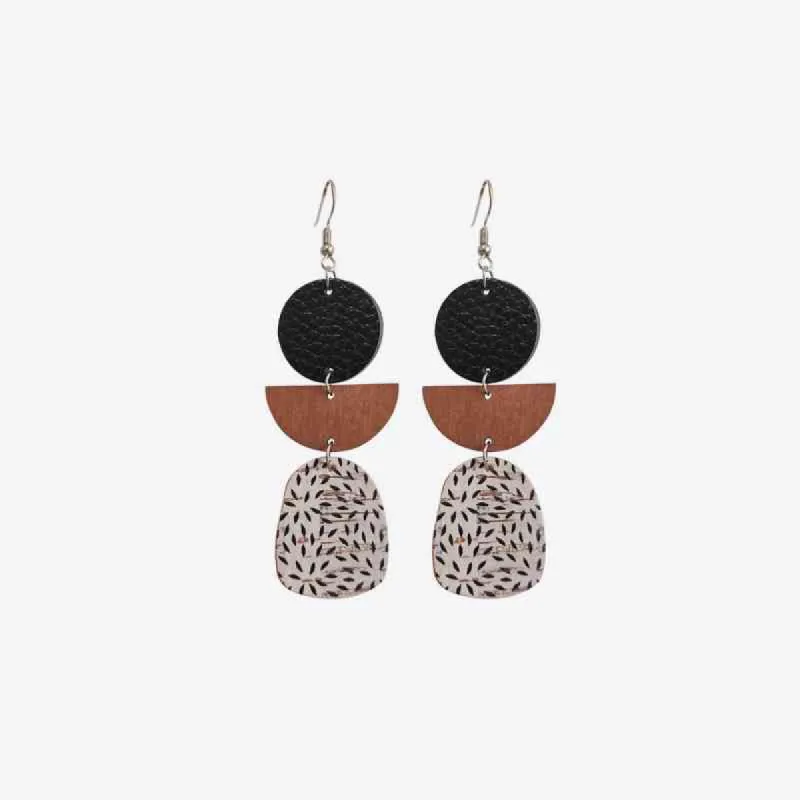 Leather & Wood Drop Earrings sold by Charming Charlie