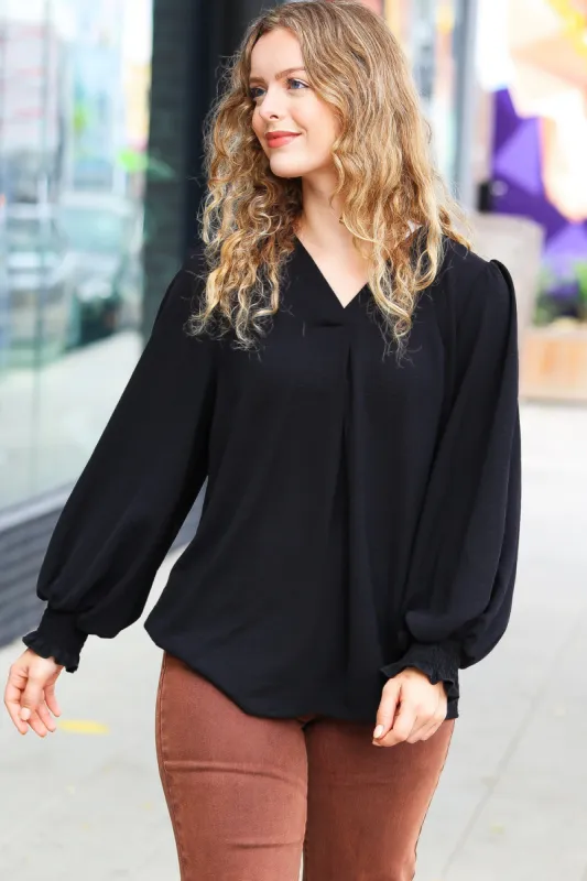 Feeling Bold Black Banded V Neck Smocked Top sold by Charming Charlie