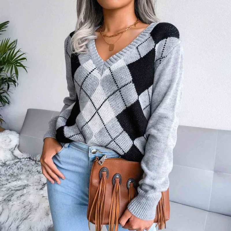 Geometric V-Neck Sweater sold by Charming Charlie