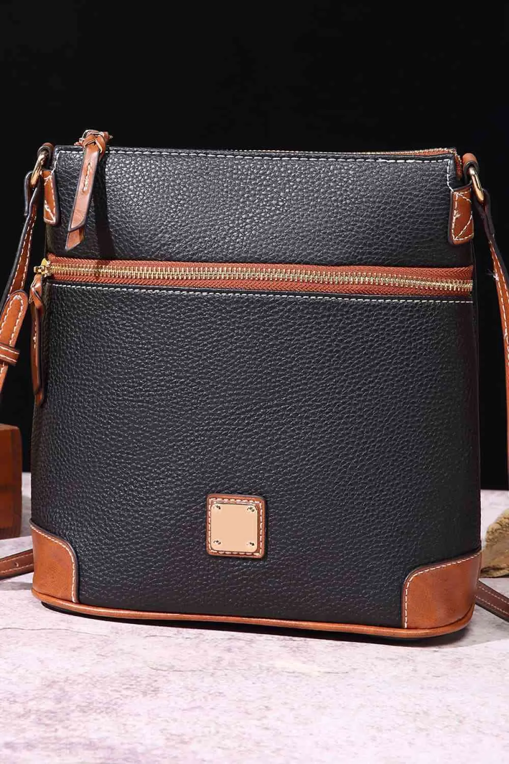 PU Leather Crossbody Bag sold by Charming Charlie