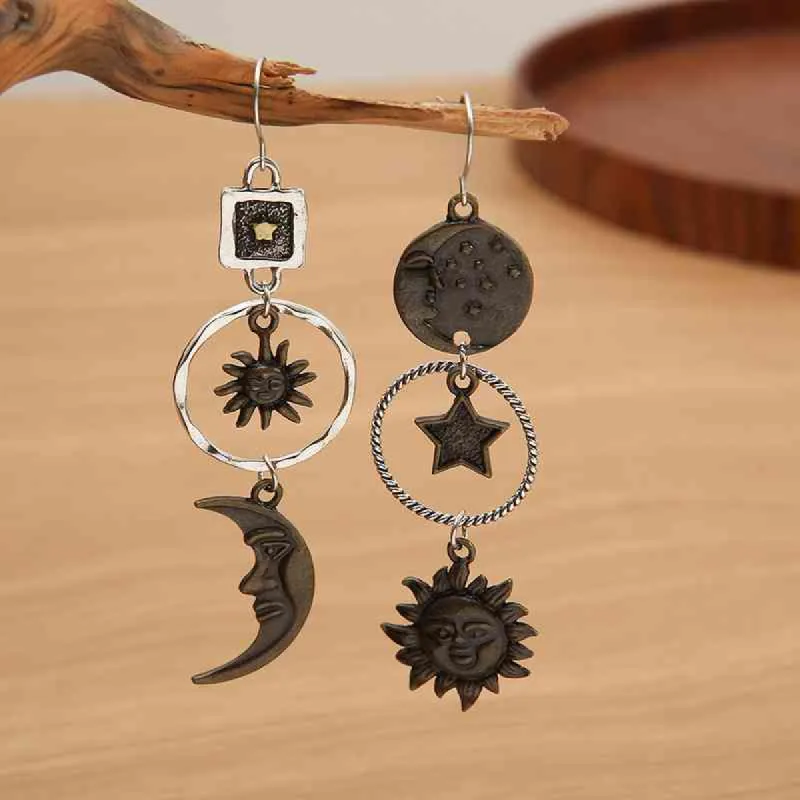 Star, Sun, and Moon Earrings sold by Charming Charlie