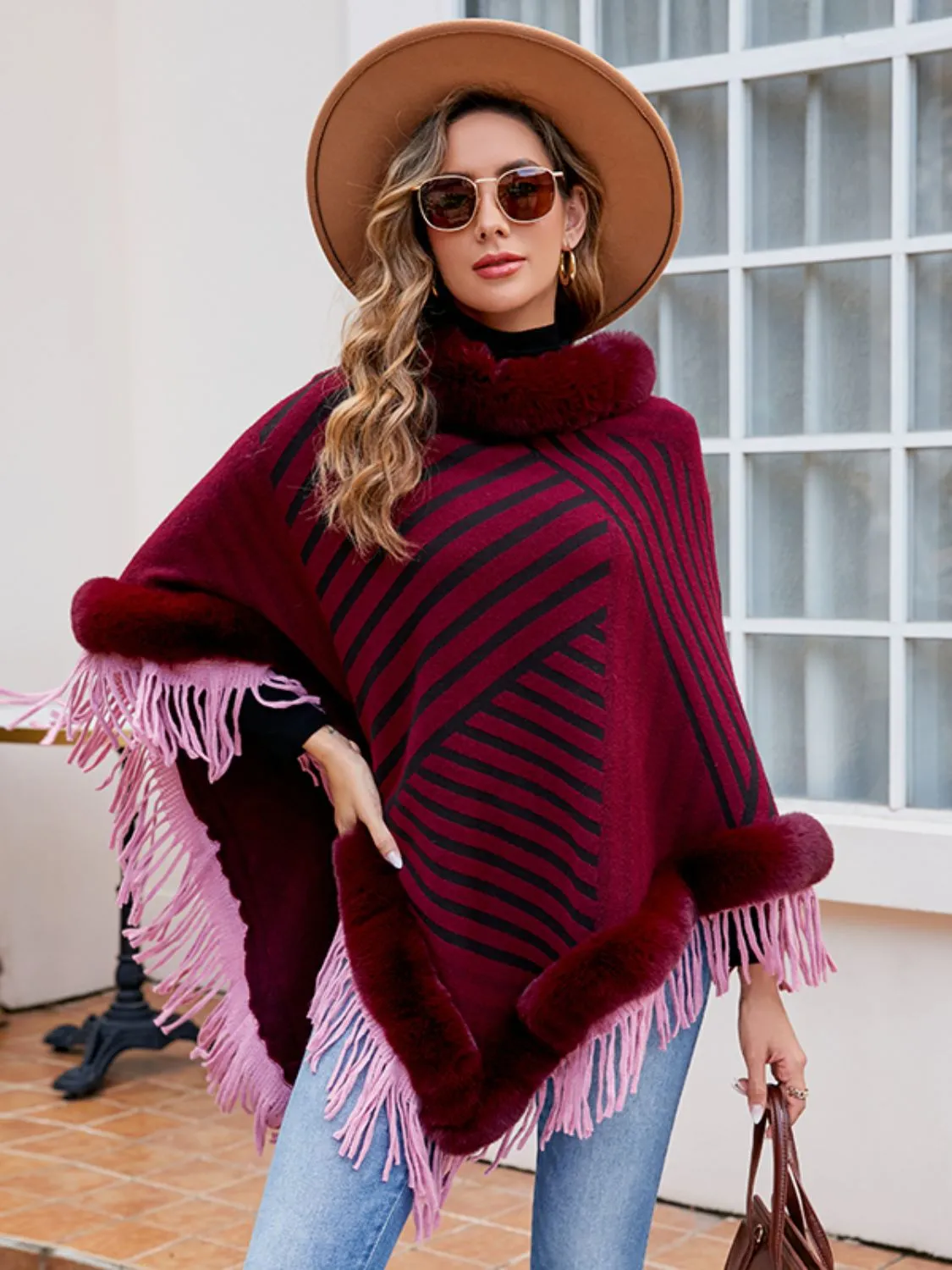 Striped Fringe Hem Poncho sold by Charming Charlie