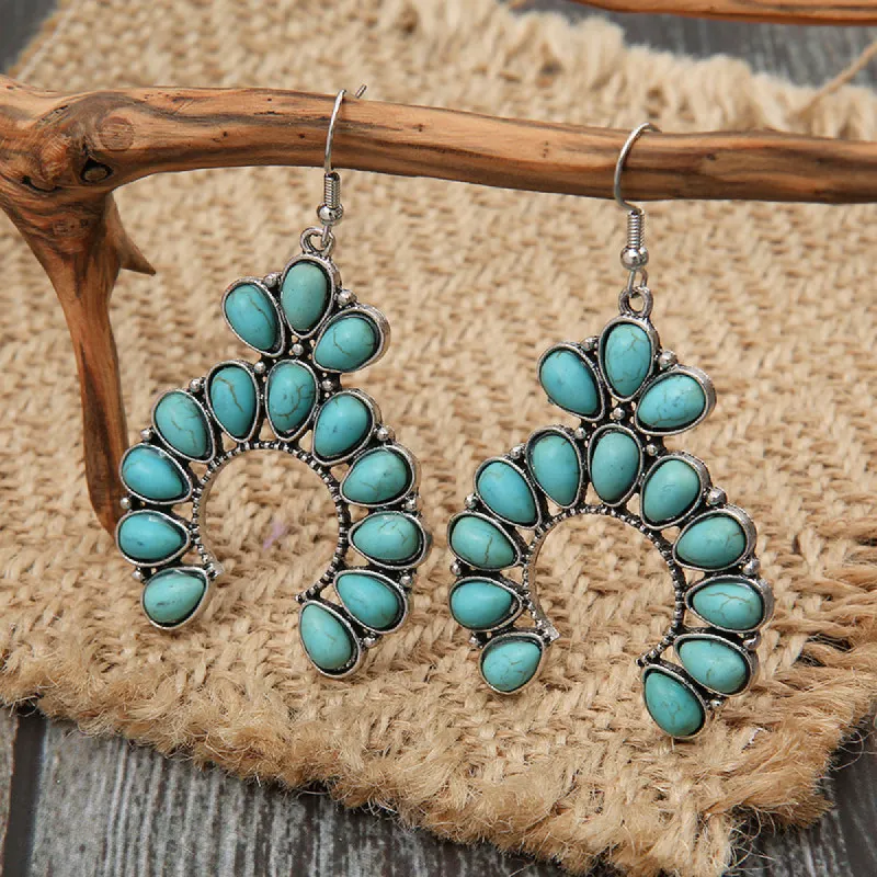 Artificial Turquoise Drop Earrings sold by Charming Charlie