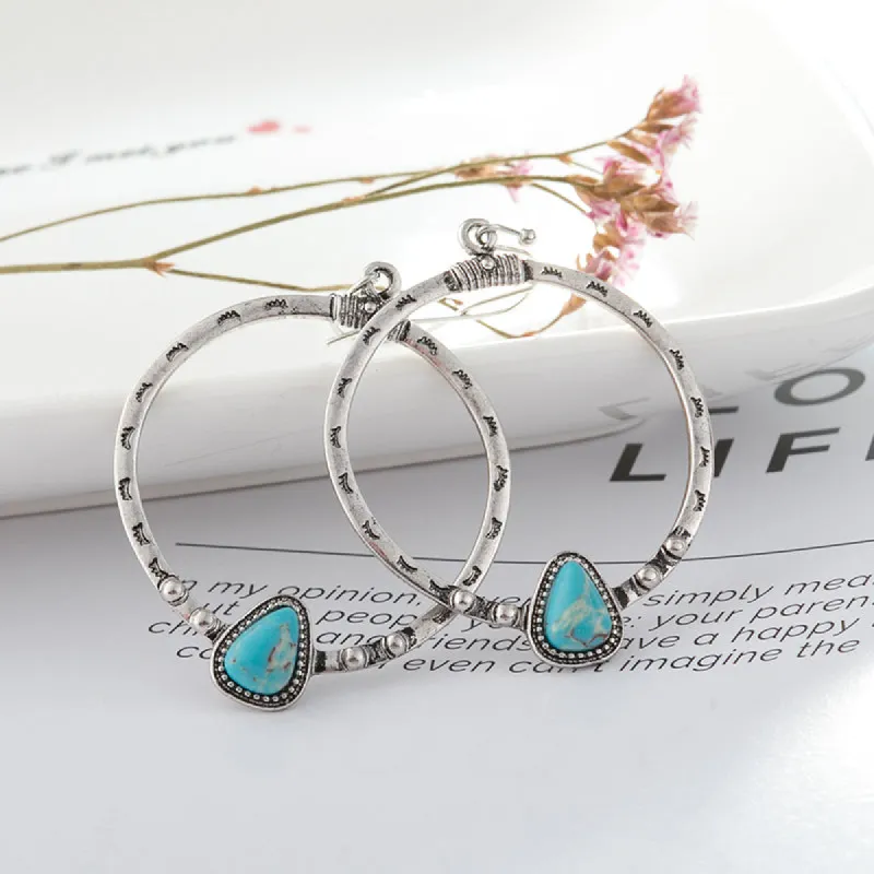Artificial Turquoise Drop Earrings sold by Charming Charlie