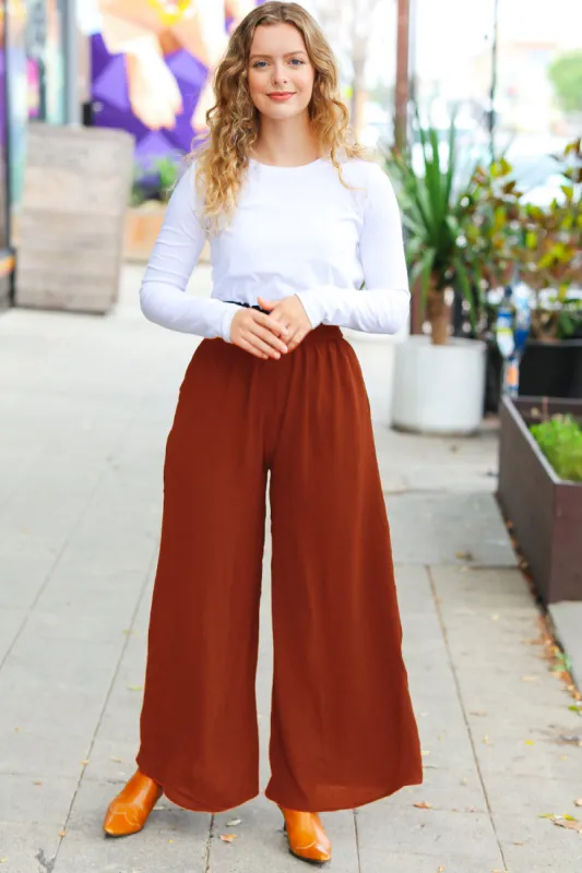 Relaxed Fun Rust Smocked Waist Palazzo Pants sold by Charming Charlie