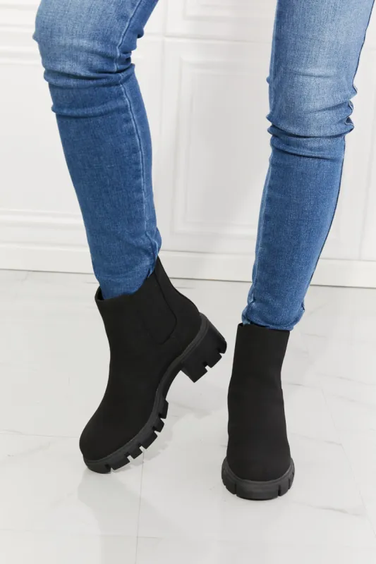 Work For It Matte Lug Sole Chelsea Boots in Black sold by Charming Charlie