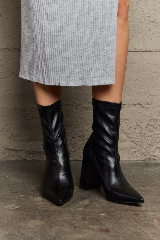 Weeboo Stacy Block Heel Sock Boots sold by Charming Charlie