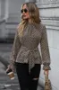 Printed Tie Front Flounce Sleeve Blouse sold by Charming Charlie