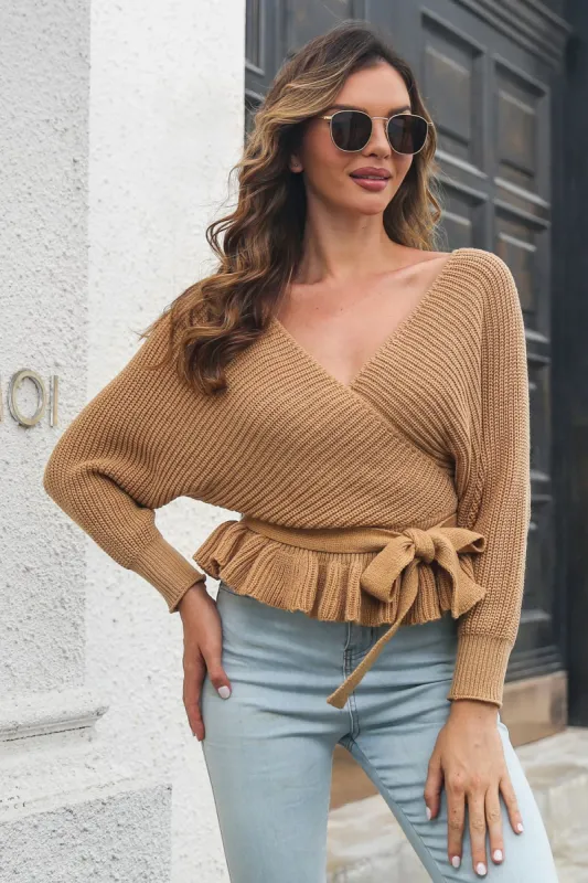 Tie Waist Ruffle Hem Sweater sold by Charming Charlie