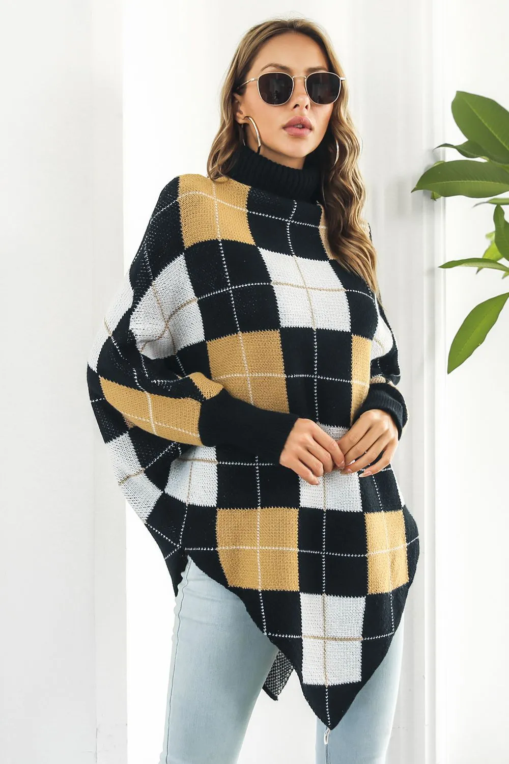 Plaid Turtleneck Dolman Sleeve Poncho sold by Charming Charlie