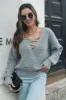Crisscross Surplice Neck Long Sleeve Sweater sold by Charming Charlie