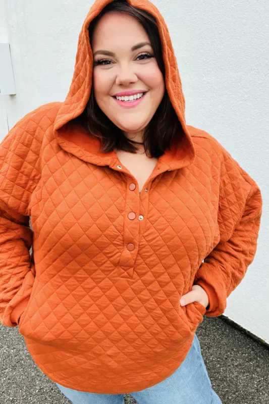 Feeling Bold Burnt Orange Quilted Quarter Snap Hoodie sold by Charming Charlie