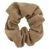 Tan Scrunchie sold by Charming Charlie