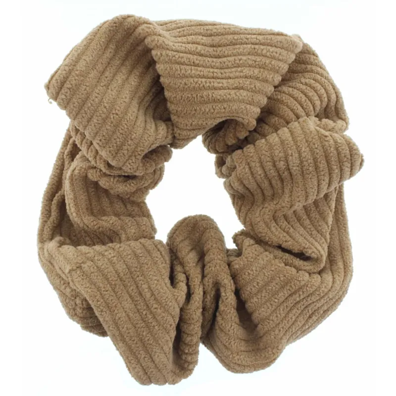 Tan Scrunchie sold by Charming Charlie