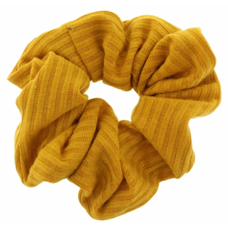 Mustard Scrunchie sold by Charming Charlie