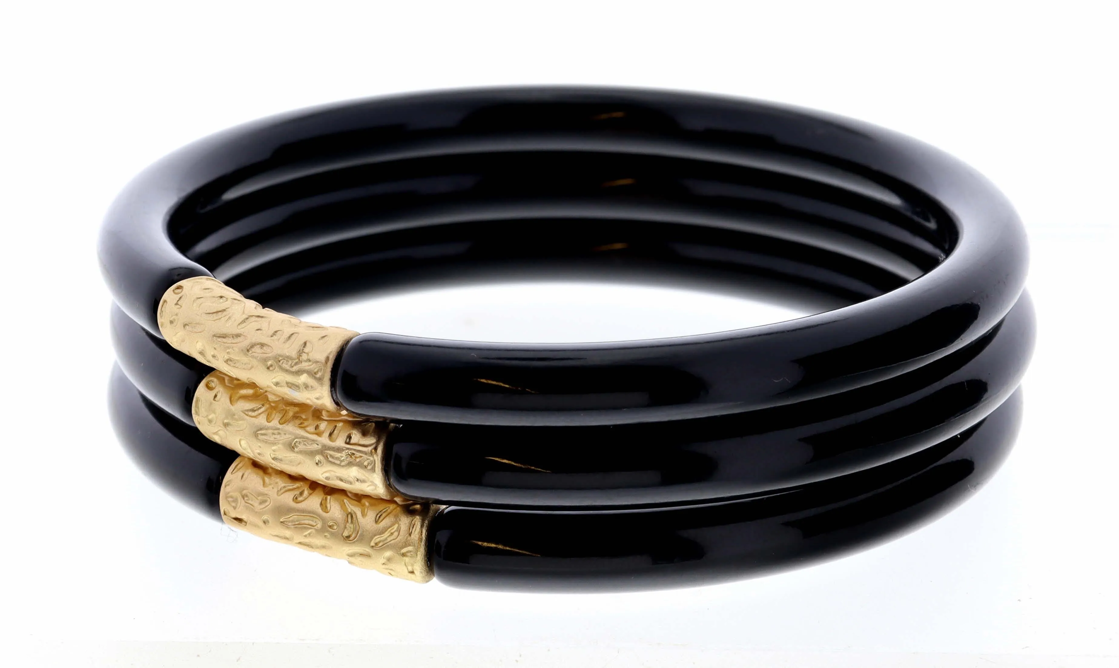 Stack of 3, Black Bangles with Gold Accent Bracelet sold by Charming Charlie