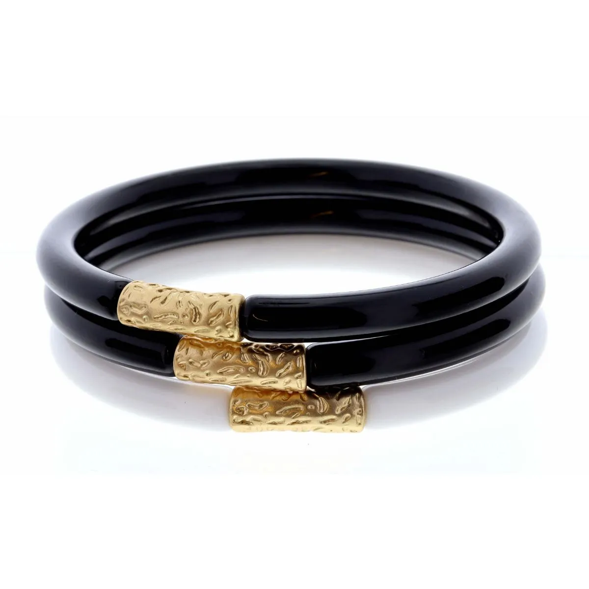 Stack of 3, White & Black Bangles with Gold Accent Bracelet sold by Charming Charlie