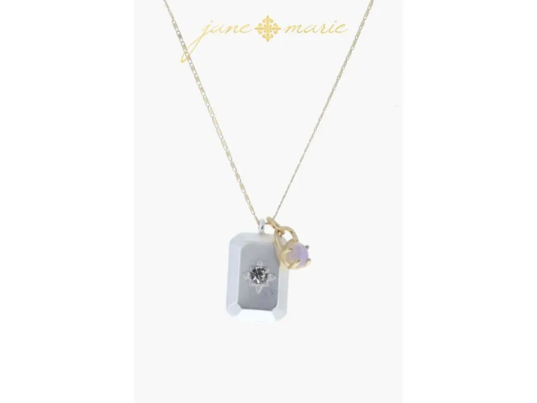 Sun Burst Disc with Moonstone Crystals, Disc and Opalite Circle Necklace sold by Charming Charlie