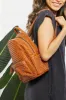SHOMICO Certainly Chic Faux Leather Woven Backpack sold by Charming Charlie