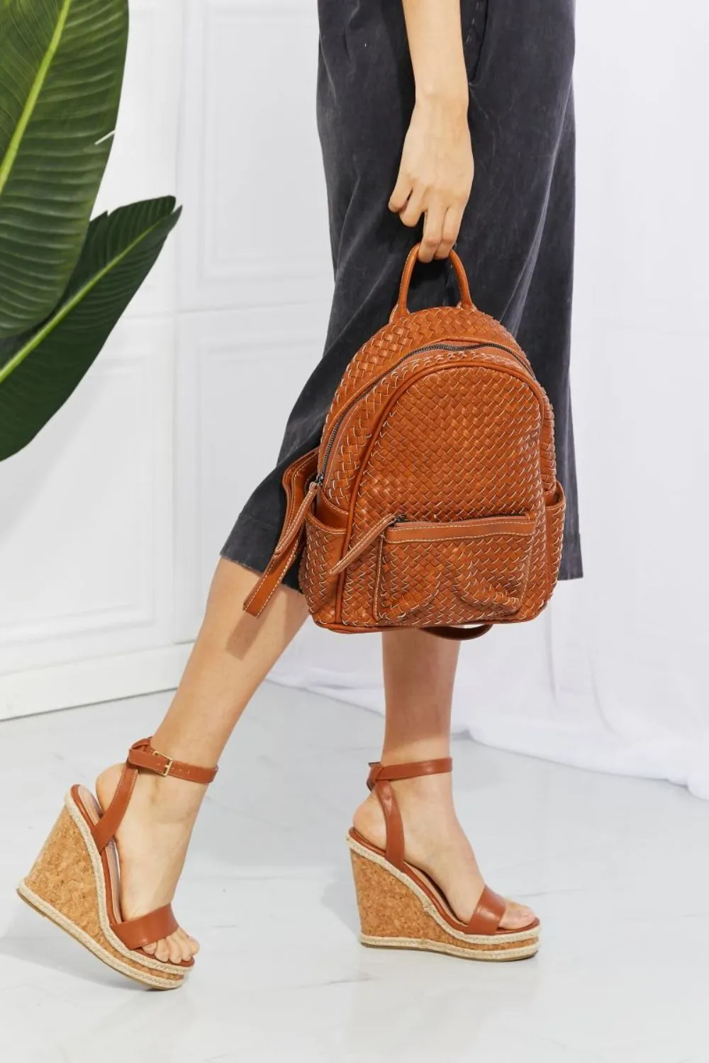SHOMICO Certainly Chic Faux Leather Woven Backpack sold by Charming Charlie product image thumbnail 4