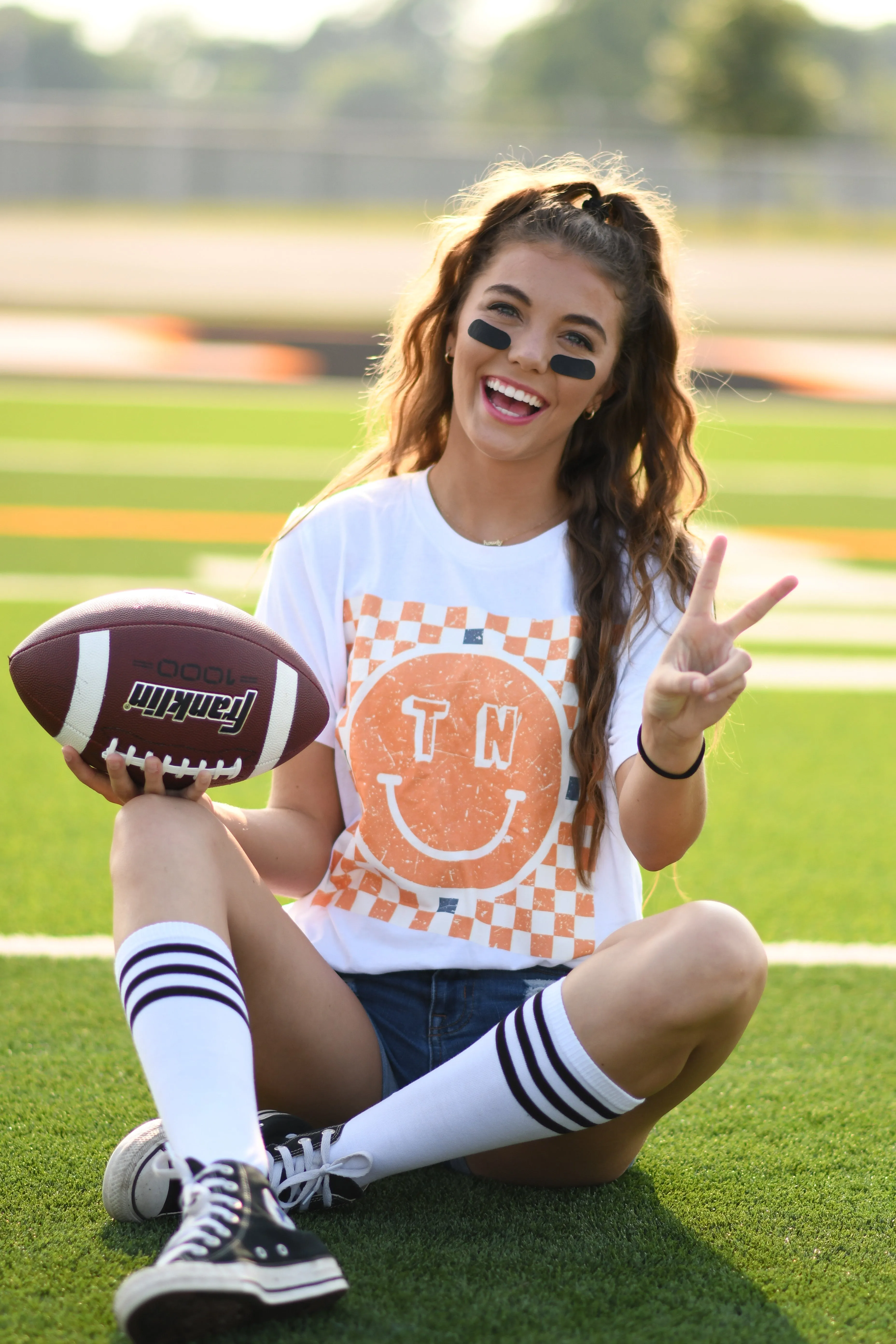 TN Checkered Smiley Tee sold by Charming Charlie product image thumbnail 3