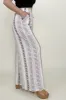 Geo Stripe Smocked Waist Wide Leg Pants sold by Charming Charlie