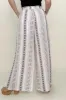 Geo Stripe Smocked Waist Wide Leg Pants sold by Charming Charlie