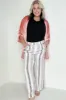Geo Stripe Smocked Waist Wide Leg Pants sold by Charming Charlie