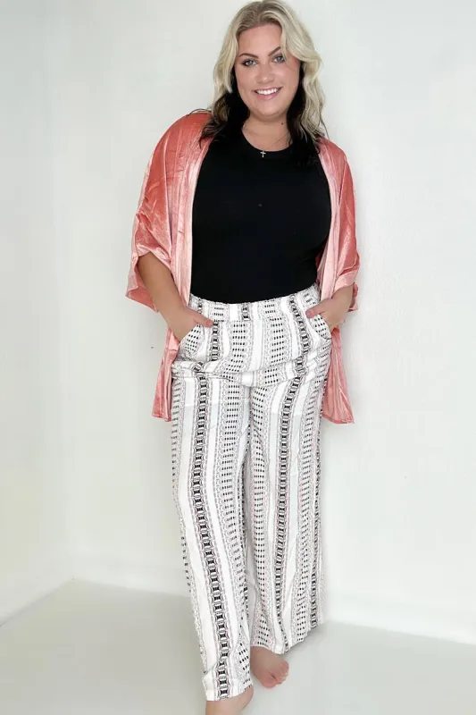 Geo Stripe Smocked Waist Wide Leg Pants sold by Charming Charlie