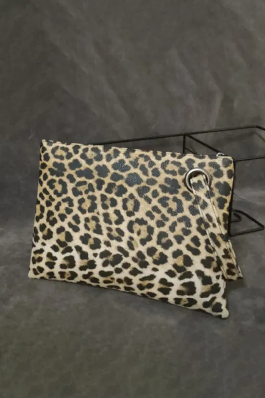 Leopard PU Leather Clutch sold by Charming Charlie
