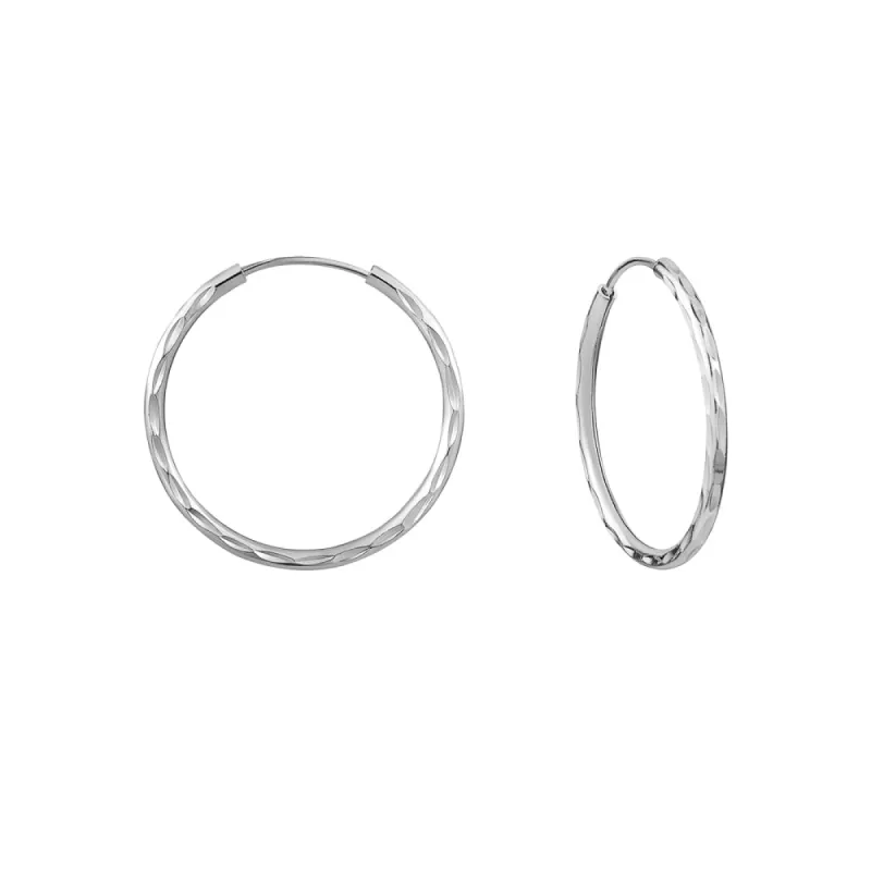 Sterling Silver Diamond Cut Endless Hoops sold by Charming Charlie